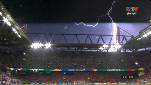 EURO 2024 Sideline Highlights: Danish Fans Brave the Rain and the Dortmund Stadium Waterfall - image 4