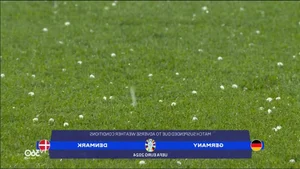 EURO 2024 Sideline Highlights: Danish Fans Brave the Rain and the Dortmund Stadium Waterfall - image 8