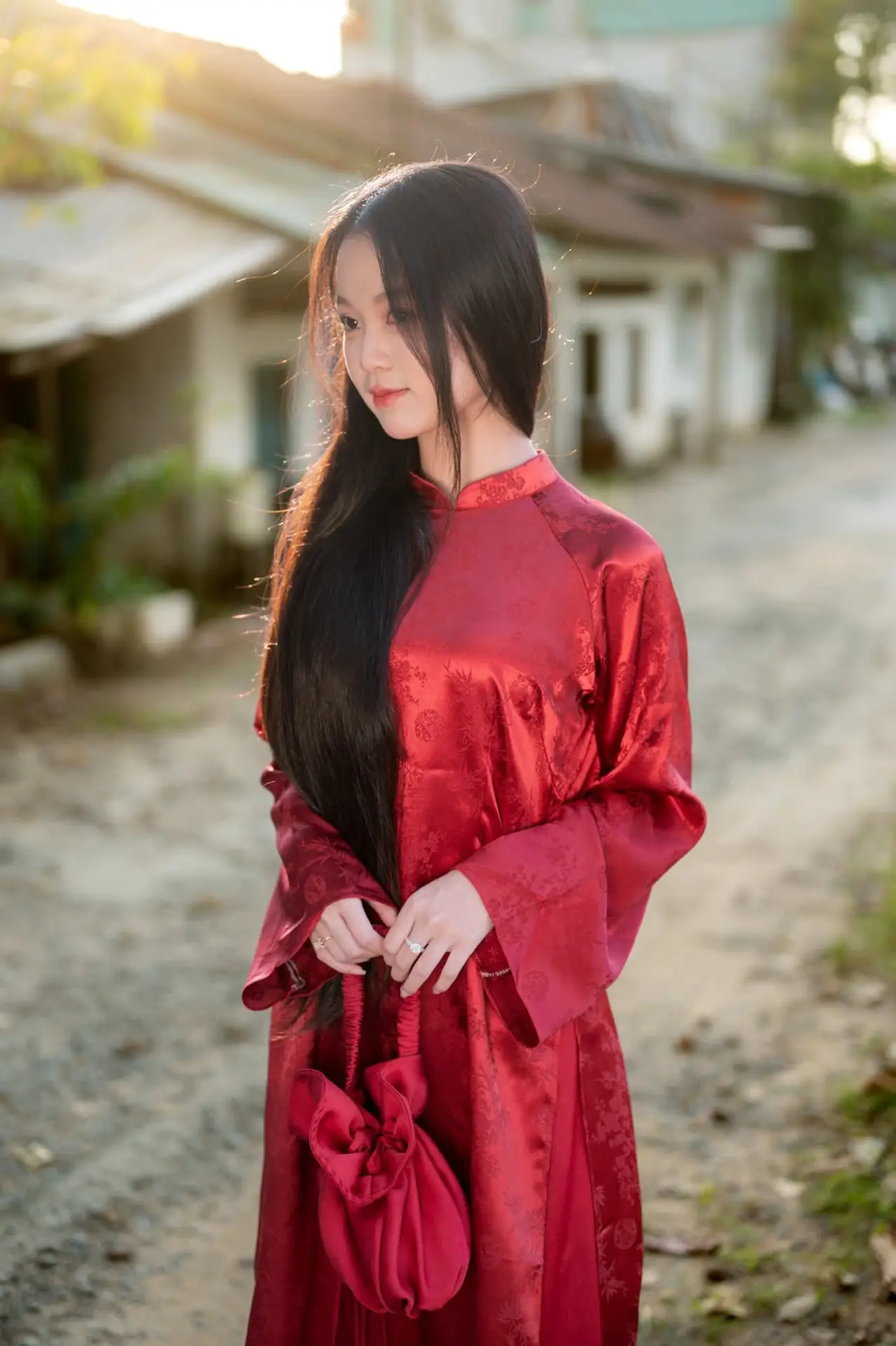 Elegant Vietnamese Beauty in Red Ao Dai: A Glimpse into Traditional Grace