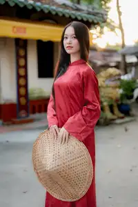 Elegant Vietnamese Beauty in Red Ao Dai: A Glimpse into Traditional Grace - image 13