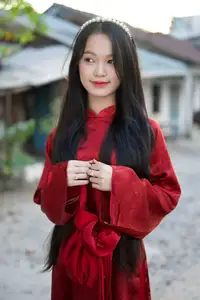 Elegant Vietnamese Beauty in Red Ao Dai: A Glimpse into Traditional Grace - image 16