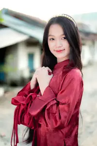Elegant Vietnamese Beauty in Red Ao Dai: A Glimpse into Traditional Grace - image 17
