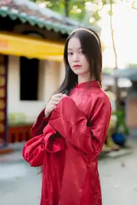 Elegant Vietnamese Beauty in Red Ao Dai: A Glimpse into Traditional Grace - image 7