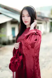 Elegant Vietnamese Beauty in Red Ao Dai: A Glimpse into Traditional Grace - image 6