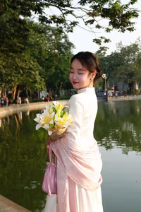 VGU No.148: Radiant Smile in Traditional Ao Dai: Elegant Vietnamese Beauty by the Lake. - image 3