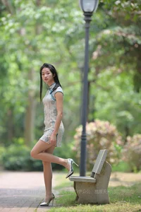 Stunning Qipao Fashion Gallery Featuring Model Ning Ning in Lush Greenery Settings - image 19