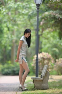 Stunning Qipao Fashion Gallery Featuring Model Ning Ning in Lush Greenery Settings - image 0