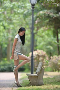Stunning Qipao Fashion Gallery Featuring Model Ning Ning in Lush Greenery Settings - image 2