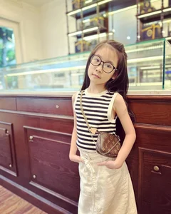 VTV Host Quoc Khanh's Wife Shares Heartwarming Family Portraits - image 9