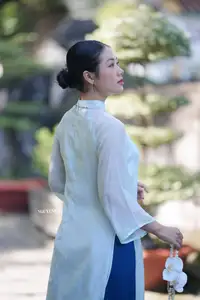 Elegant Vietnamese Girl in Traditional Ao Dai Capturing Timeless Asian Beauty - image 3