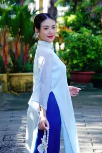 Elegant Vietnamese Girl in Traditional Ao Dai Capturing Timeless Asian Beauty - image 11