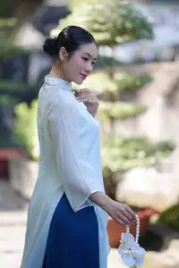 Elegant Vietnamese Girl in Traditional Ao Dai Capturing Timeless Asian Beauty - image 5