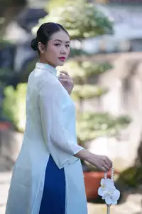 Elegant Vietnamese Girl in Traditional Ao Dai Capturing Timeless Asian Beauty - image 7