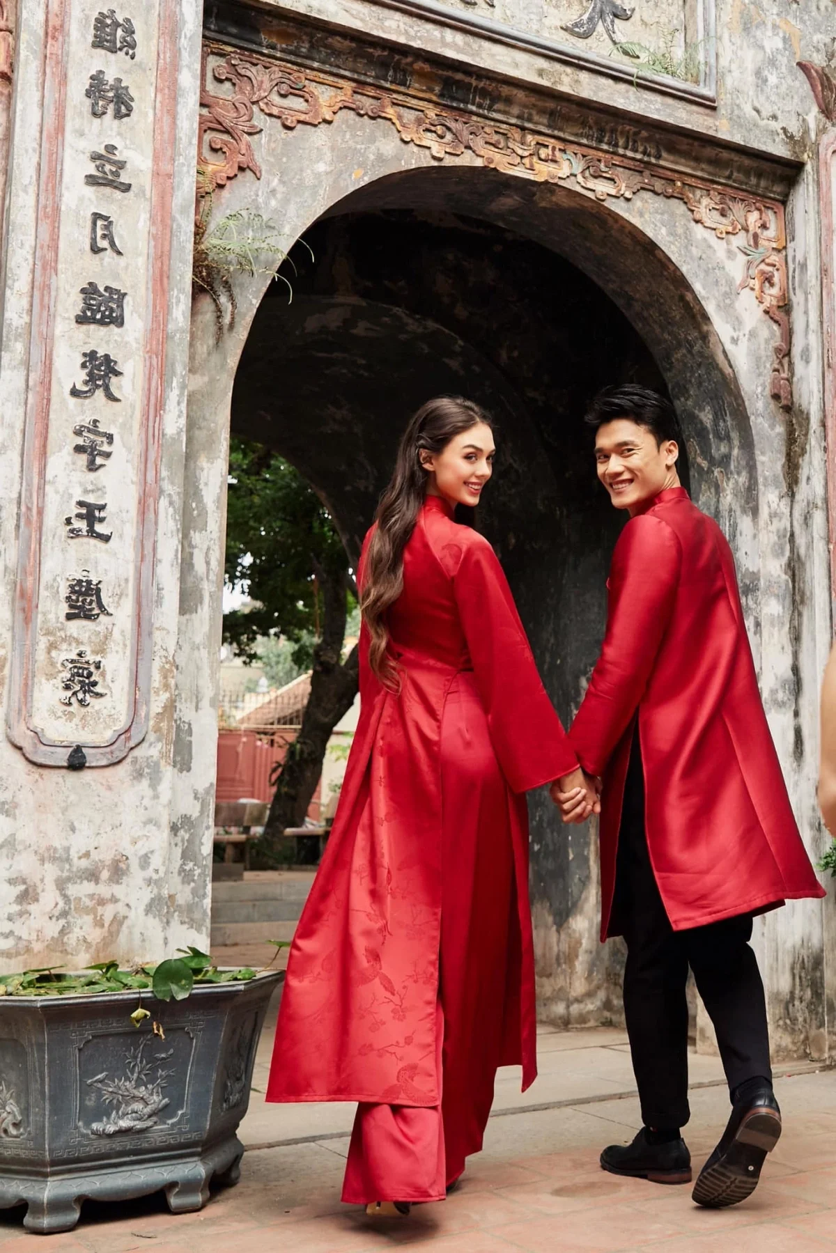 Dianka Zakhidova and Bui Tien Dung Wear Ao Dai for Tet Photoshoot