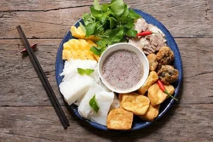 Must-Try Culinary Specialties and Street Food in Hanoi - image 14