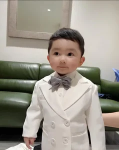 Chi Bao's Dapper Son Steals the Spotlight in Handsome Vest Outfit - image 4
