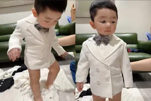 Chi Bao's Dapper Son Steals the Spotlight in Handsome Vest Outfit - image 3