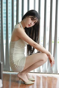 IESS Xiaobao in a Stunning Halter Neck Bodycon Dress Gallery - image 9