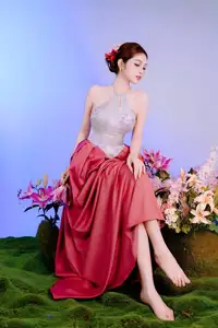 Elegant Beauty: Graceful Vietnamese Young Woman in Modern Attire with Lilies - image 1