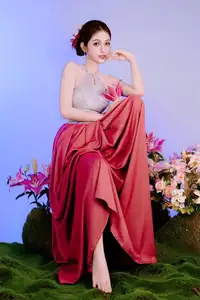 Elegant Beauty: Graceful Vietnamese Young Woman in Modern Attire with Lilies - image 2