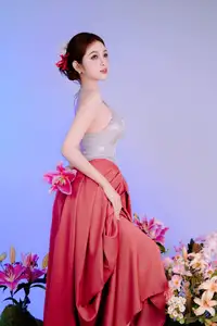 Elegant Beauty: Graceful Vietnamese Young Woman in Modern Attire with Lilies - image 20