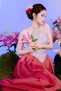 Elegant Beauty: Graceful Vietnamese Young Woman in Modern Attire with Lilies - image 22