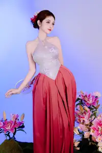 Elegant Beauty: Graceful Vietnamese Young Woman in Modern Attire with Lilies - image 0