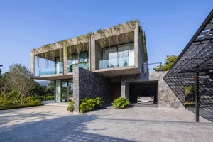 Dora Villa: Sustainable Raw Concrete Architecture Filled with Natural Light - image 4