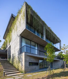 Dora Villa: Sustainable Raw Concrete Architecture Filled with Natural Light - image 5