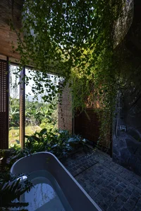 Dora Villa: Sustainable Raw Concrete Architecture Filled with Natural Light - image 9