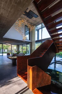 Dora Villa: Sustainable Raw Concrete Architecture Filled with Natural Light - image 7