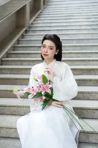 Serene Vietnamese Beauty: A Gentle Muse in White with Pink Lilies - image 10
