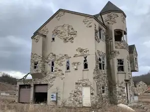 Mystery Resort: A Decade-Long Abandoned Villa Village, Haunting Scene - image 1
