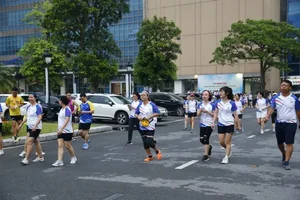 VTV Staff Participate in Running Event for 99th Vietnam Revolutionary Press Day - image 5