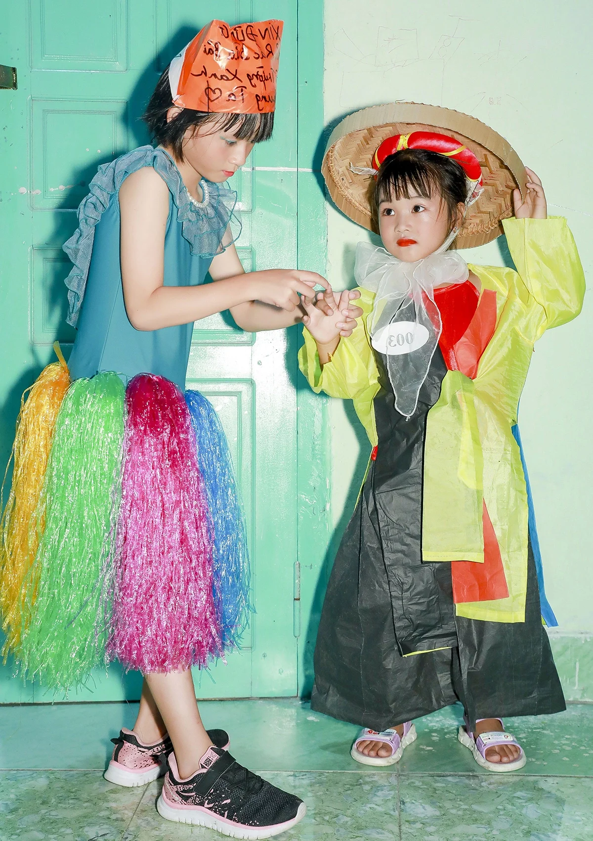 Trang Tran Daughter Shines in Eco-Friendly Recycled Fashion Show