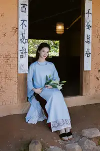 Serene Beauty: Graceful Young Woman in Traditional Attire with White Lilies - image 8