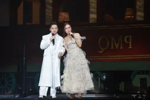 A Decade of Music: Phan Mạnh Quỳnh and Mỹ Tâm Deliver Iconic Performance at Anniversary Live Concert - image 4