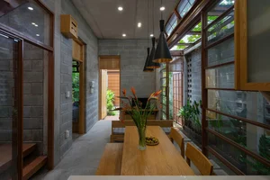 The Beauty of Raw Architecture: A Unique Unpainted House Designed as a Self-Sustaining Ecosystem - image 3