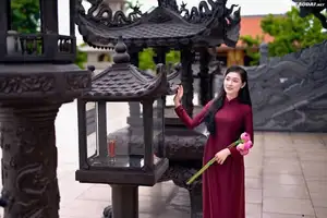 Graceful Vietnamese Ao Dai: Serene Beauty at Majestic Mountain Temple - image 6