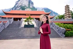 Graceful Vietnamese Ao Dai: Serene Beauty at Majestic Mountain Temple - image 2