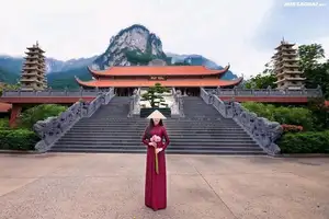 Graceful Vietnamese Ao Dai: Serene Beauty at Majestic Mountain Temple - image 4
