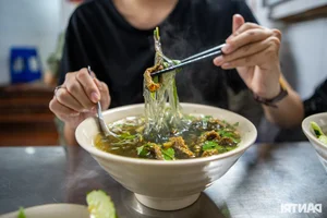 Tiny 20sqm Hanoi Eel Noodle Shop Earns Michelin Recognition - image 5