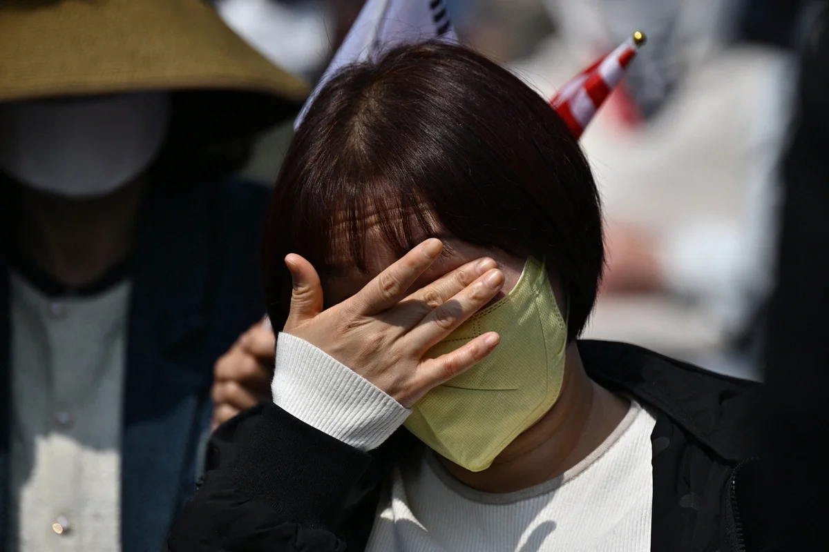 Mixed Public Emotions Following Historic Impeachment of South Korean President