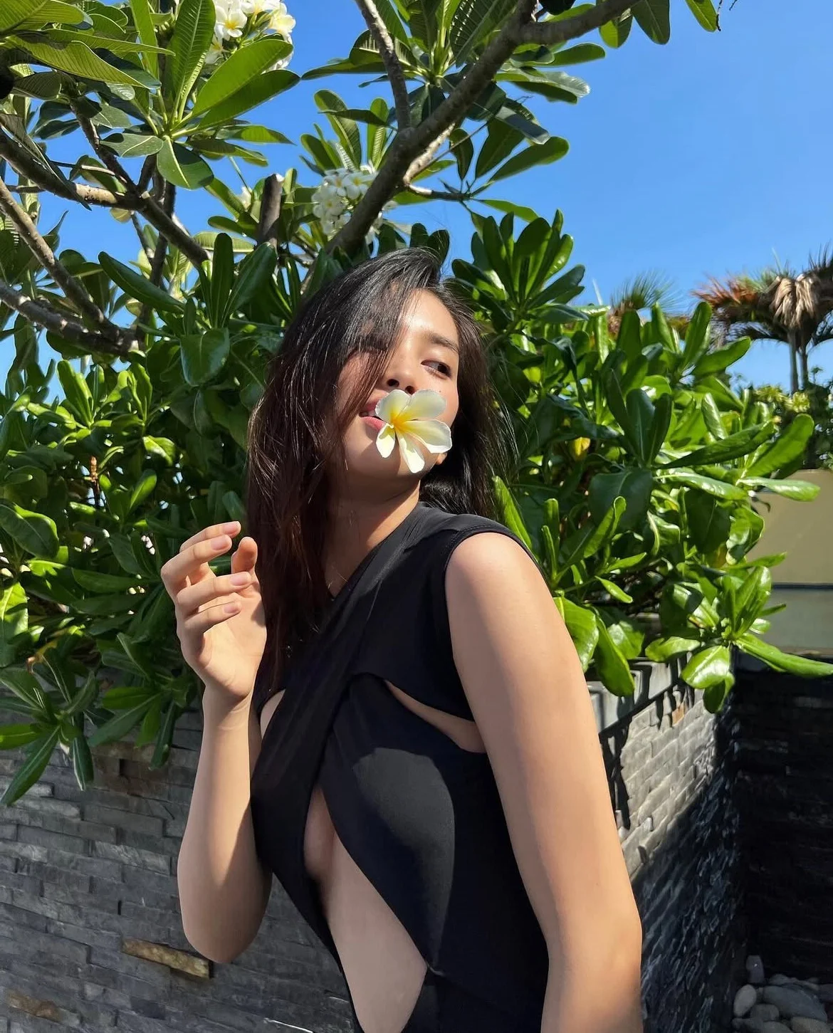 Miss Vietnam Tieu Vy Stuns in Vibrant Pink Swimwear During Beach Getaway
