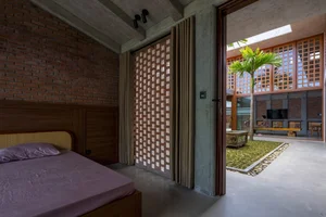 Hidden Oasis: The L-Shaped House in Tam Ky That Defies Narrow Alley Constraints - image 2