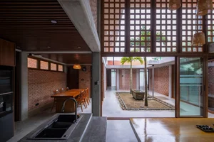Hidden Oasis: The L-Shaped House in Tam Ky That Defies Narrow Alley Constraints - image 1