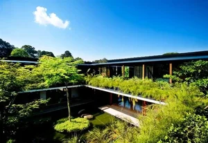 Stunning Resort-Style Home Features Lush Rooftop Garden and Serene Water Features - image 1