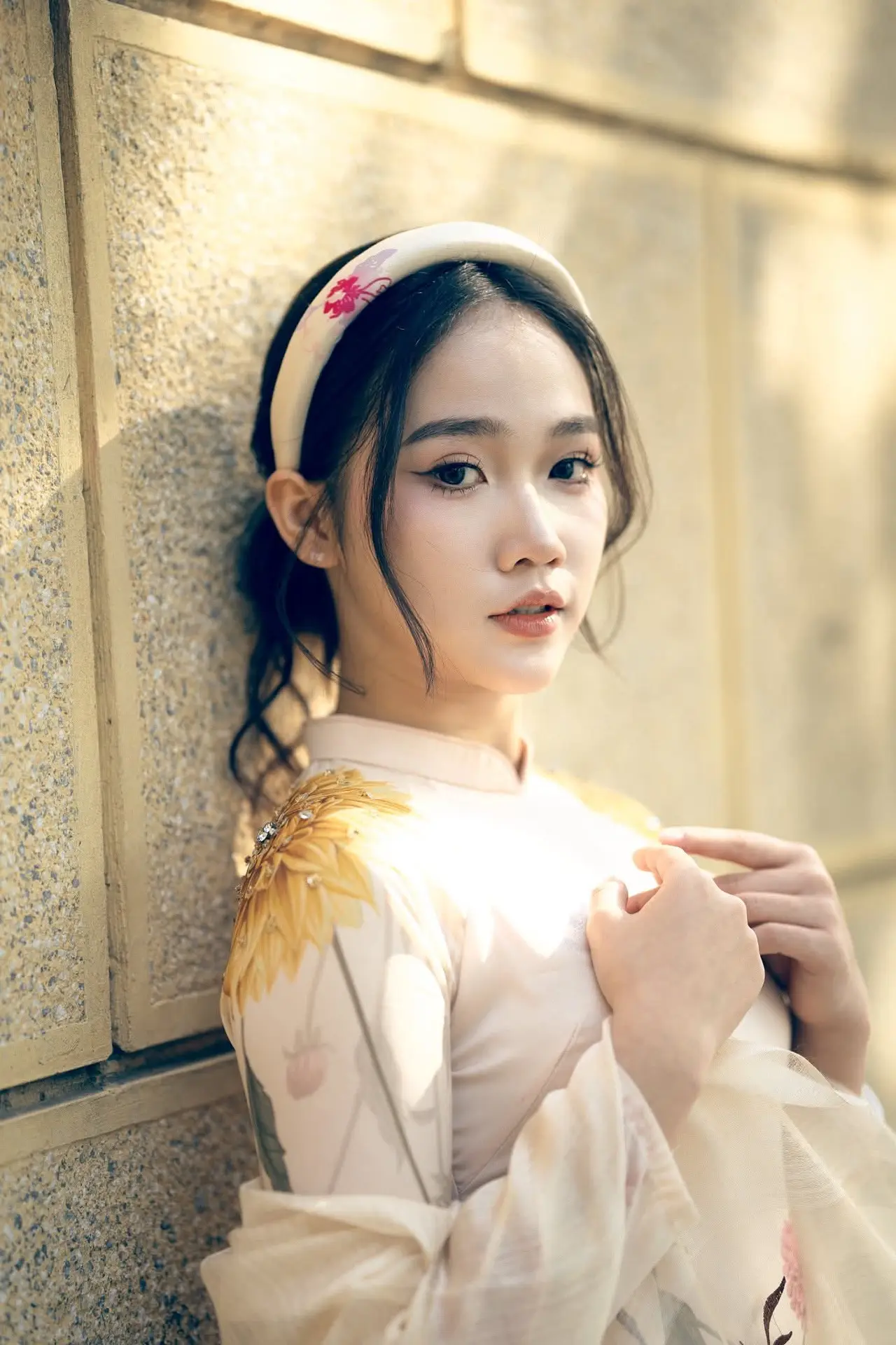 Graceful Vietnamese Beauty: Captivating Charm of a Girl in Elegant Traditional Attire