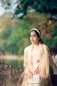 Graceful Vietnamese Beauty: Captivating Charm of a Girl in Elegant Traditional Attire - image 3
