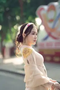 Graceful Vietnamese Beauty: Captivating Charm of a Girl in Elegant Traditional Attire - image 5